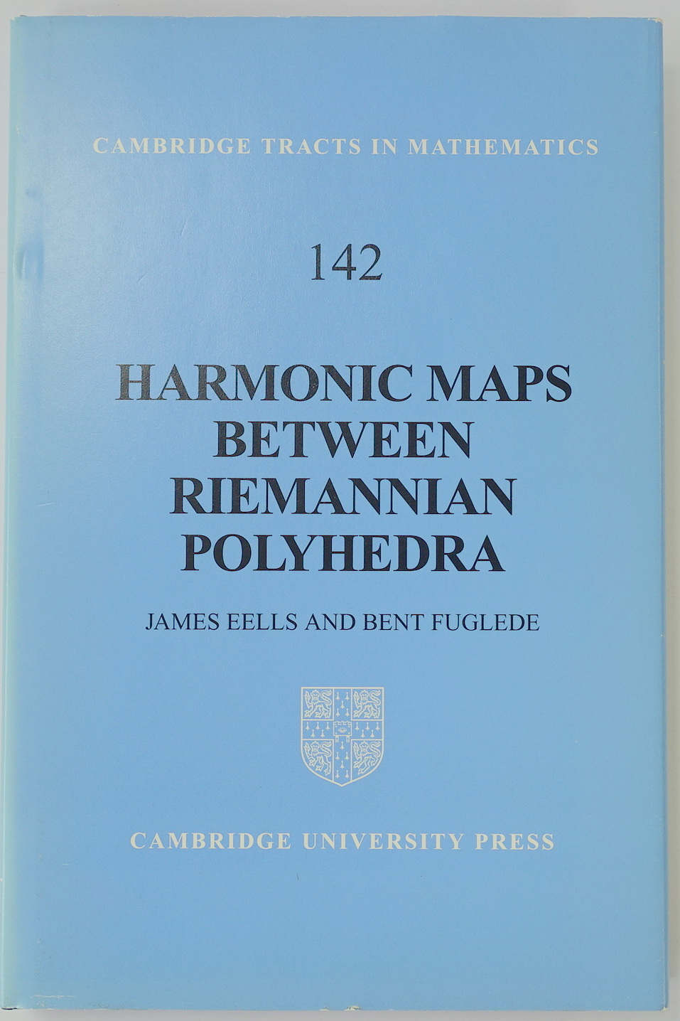 Harmonic Maps Between Riemannian Polyhedra