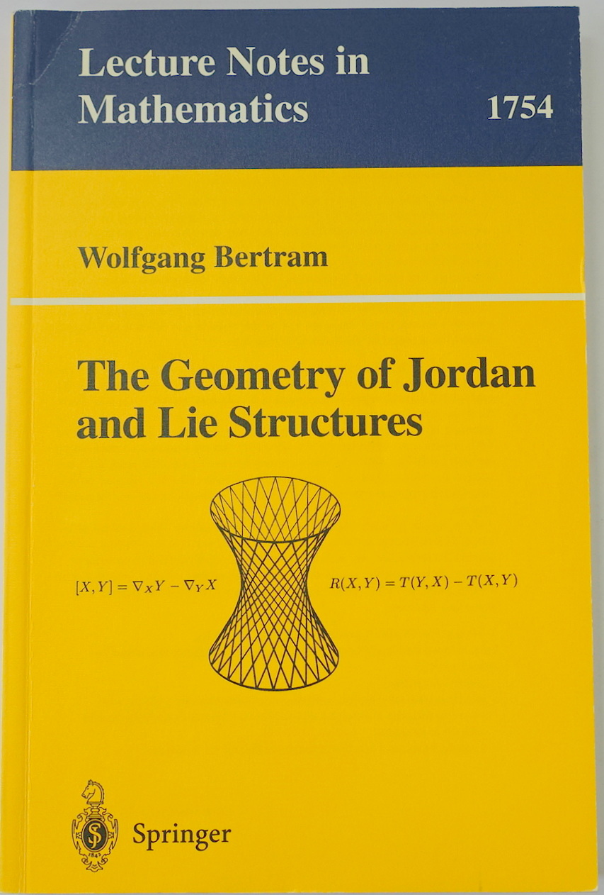 The Geometry of Jordan and Lie Structures